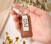 Egyedi gravírozott férfi kulcstartó – név, dátum, koordináta
